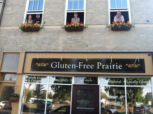 Gluten-Free Prairie storefront with people above.