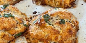 Golden baked cheese and spinach stuffed chicken breasts.