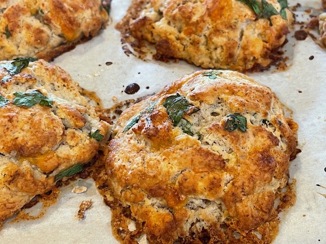 Golden baked cheese and spinach stuffed chicken breasts.